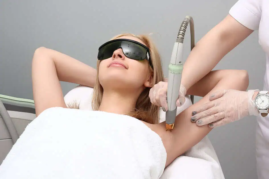 Woman receiving laser hair removal for smoother and irritation-free skin